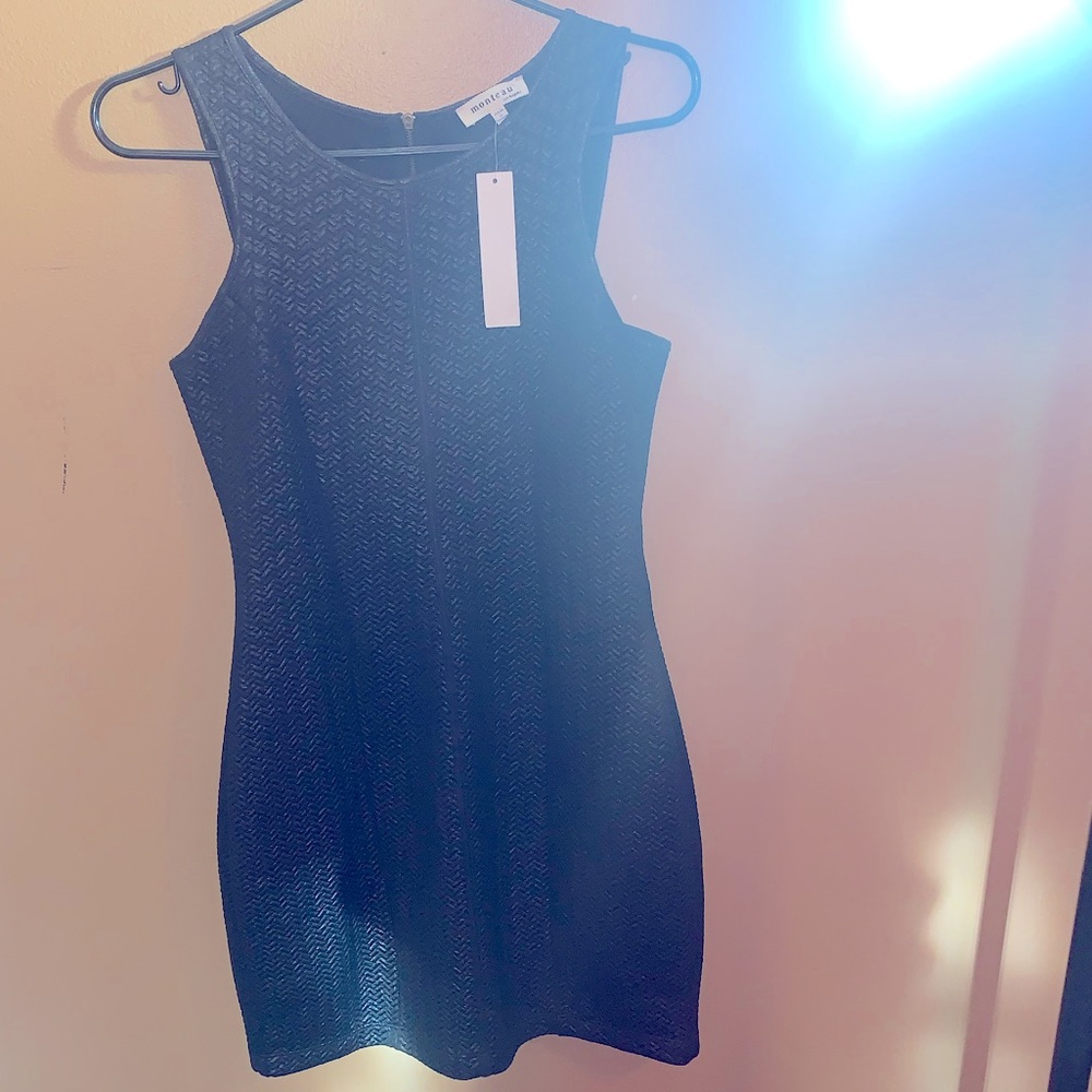 Women’s medium monteau black dress.